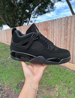 Black Cat Jordan 4s