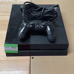 PlayStation 4 With Cords And Controller