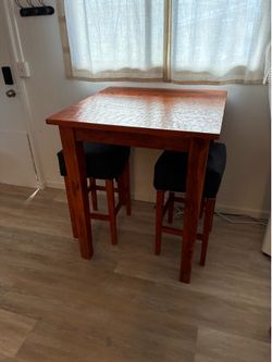 Bar table and stools