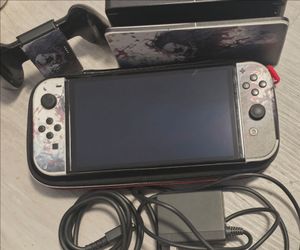 Nintendo Switch Oled model with accessories