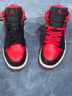 Red and black jordan 1s