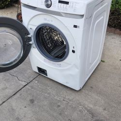 Samsung 4.5 cu. ft. Front Load Washer with  VRT Plus™ technology to reduce noise and vibration and Self Clean+ cycle to eliminate 99% of bacteria from