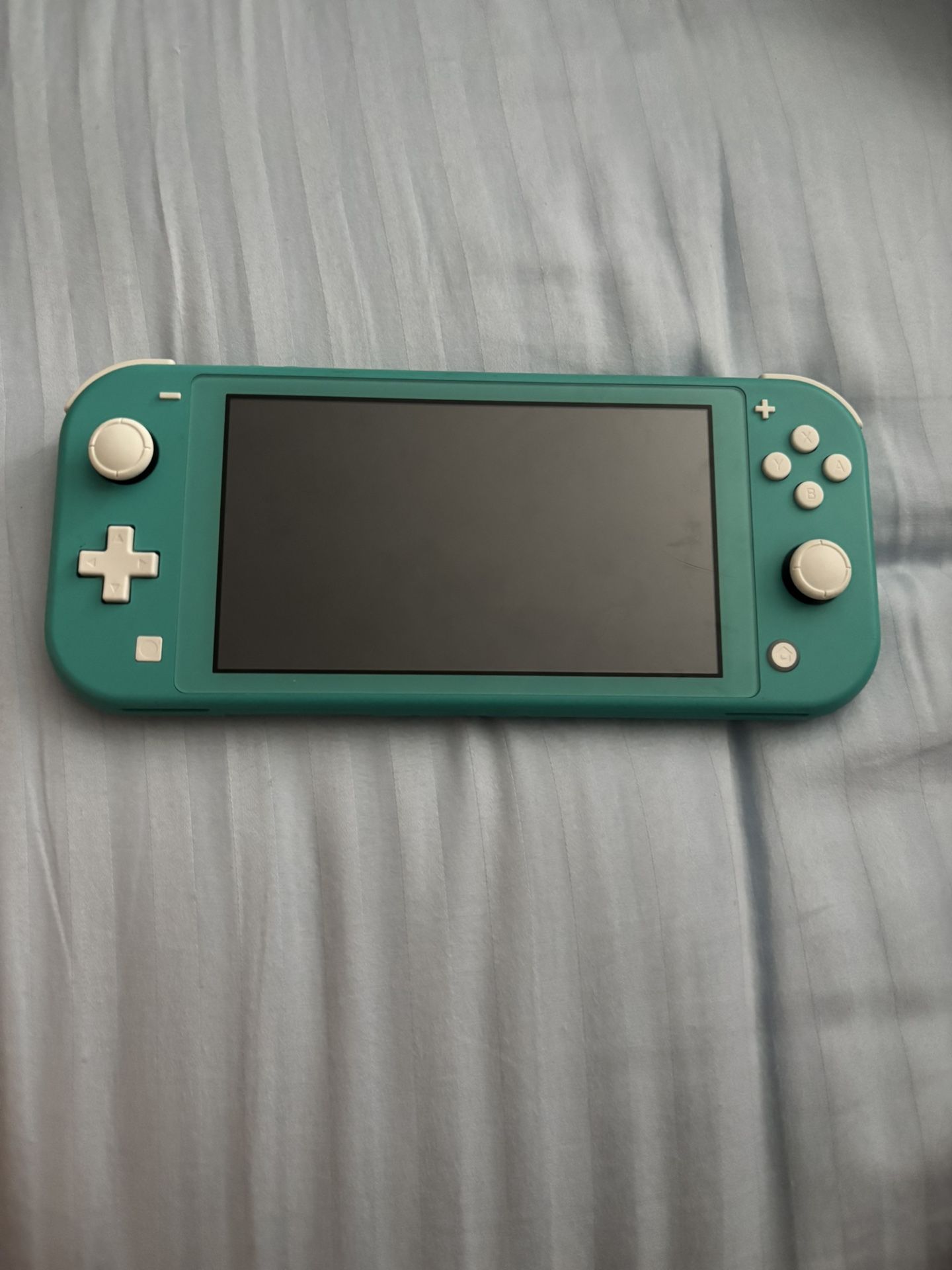 Nintendo switch lite turquoise + Animal Crossing (willing To Sell Separately)