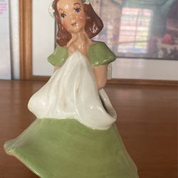 Girl That Holds Flowers  And Two People From Years Ago