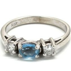 Ladies Blue Topaz/Diamond Birthstone Ring