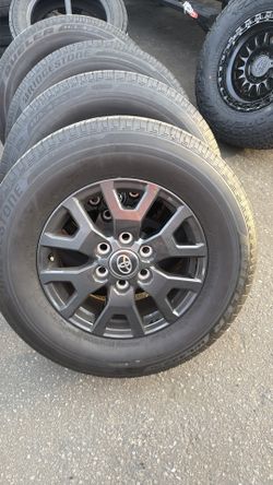 Bridgestone dueler tires with Toyota wheels