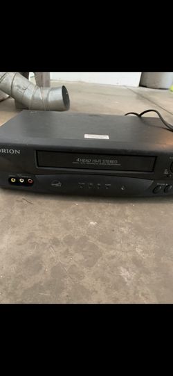 VHS player and Christmas VHS tapes