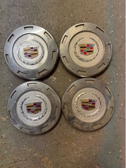 Set of 4-Cadillac OEM wheel center cap used mainly in the mid-2000s for Escalade