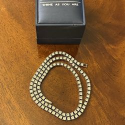 24 inch sterling silver tennis necklace with a box clasp