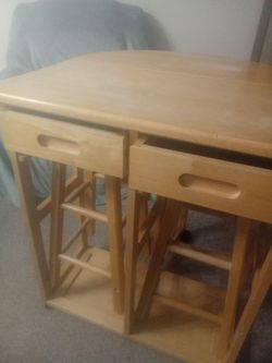 I have a table with 2 chairs for sale