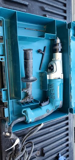 6.6 Amp 1/2 in. Corded Variable Speed Hammer Drill with Torque Limiter Side Handle Depth Gauge Chuck Key Hard Case