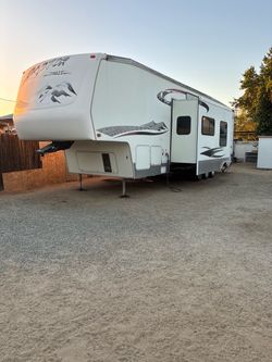 03 Keystone Raptor Toy hauler (fifth wheel )