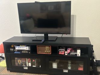 Tv & entertainment stand