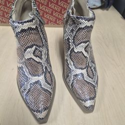 Vince Camuto GeeAnne spiced sand snake print leather ankle booties. 