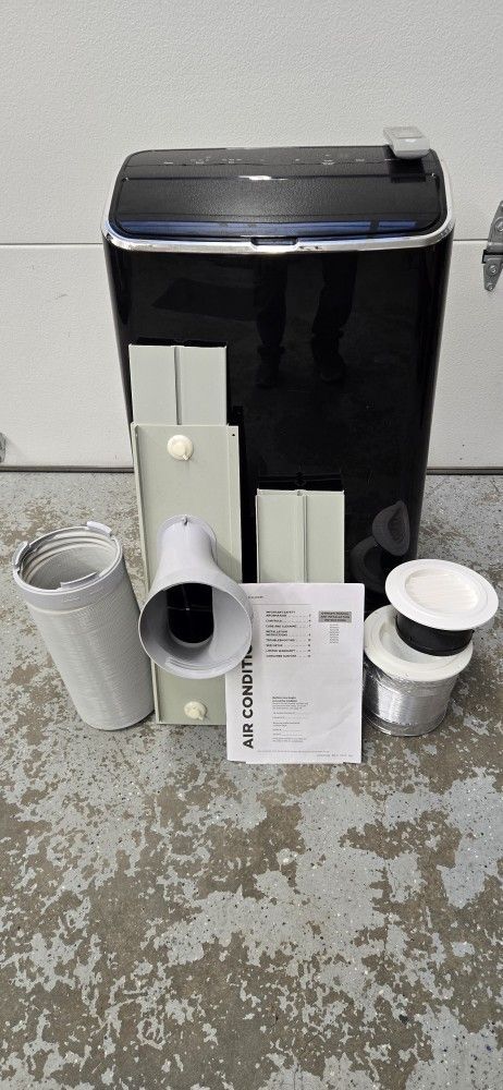 GE 10500 BTU Air Conditioner/dehumidifier/heater/fan With Remote