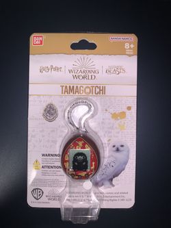 Red Tamagotchi Harry Potter Magical Creatures Electronic Game Brand New English