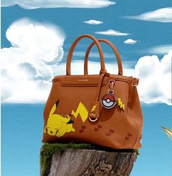 Limited Edition: Maison de Sabre x Pokémon Pikachu Tote Bag with Pokéball keychain charm.