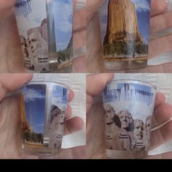 Double Sided Mount Rushmore and devils tower South Dakota shot glass Standard size excellent unused condition stored in cabinet