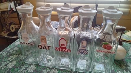 New five glass bottles 50oz