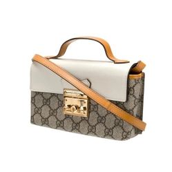 Brown and white striped crossbody bag