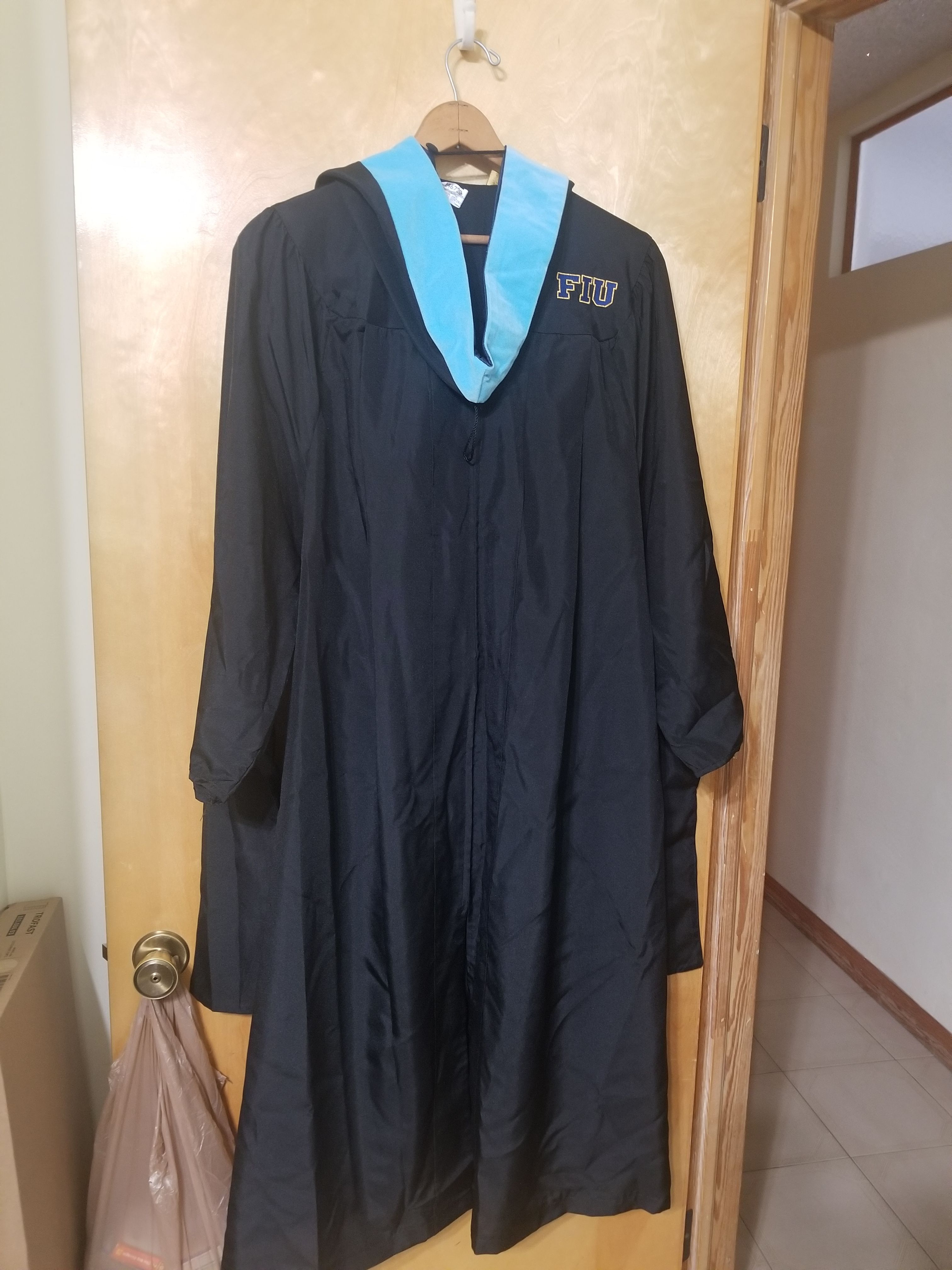 Masters graduation gown. Edu tassel and dressing. Worn once in perfect condition.