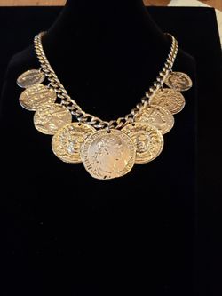 $10. Beautiful Bohemian faux coin gold tone necklace! Reversible!