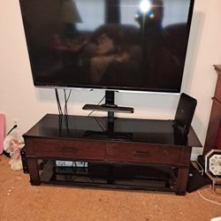 55" Smart TV With Attached To Glass Cabnet With Drawer Storage-$300