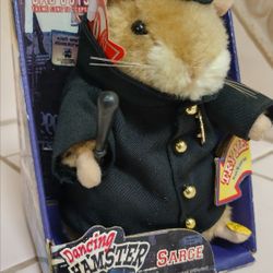 Gemmy Dancing Hamster Sarge Electronic Toy (Needs New Battery) 2002 sings bad boys.