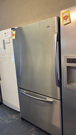 Like new Amana stainless steel refrigerator
