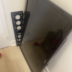 Tv 55” With Wall Stand For 70” Tv