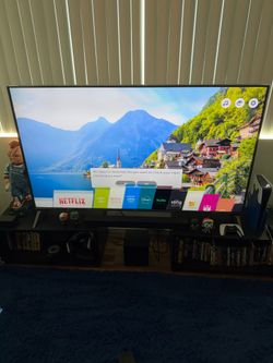 70 inch LG 4k smart tv with remote and Vizio sound bar speakers and subwoofer