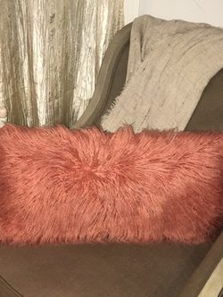 Beautiful Oblong orange fur pillow, perfect for any room decor