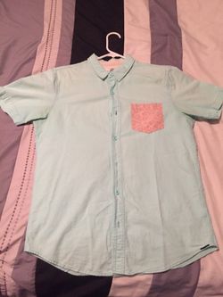 Medium teal short sleeve button up with orange print pocket