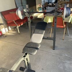 Weight Bench / Bar / Weights.    110 Dollars 