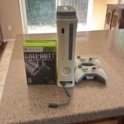 Xbox 360 with 4 Games and Controllers 
