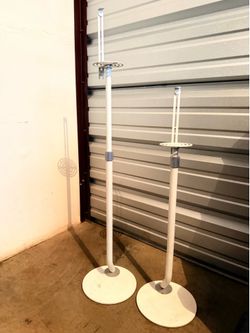 Pair of adjustable white speaker stands
