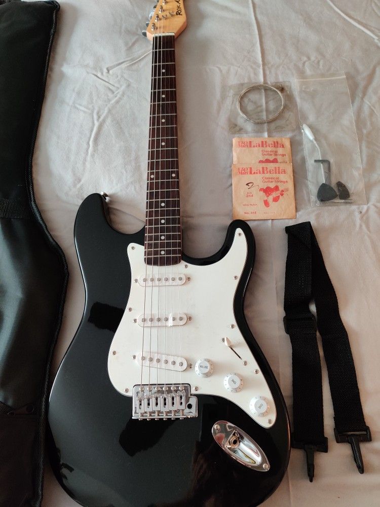 Rok Axe Electric Guitar With Amp& Stand