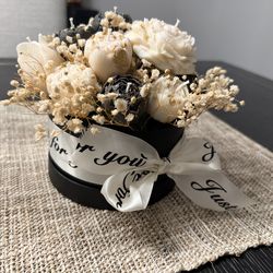 Bucket of candle flowers