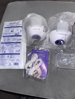 Hands-free breastfeeding set plus extras (New, never used)