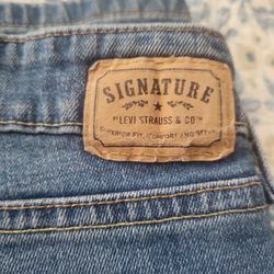 Signature Mid Rise Boot Cut