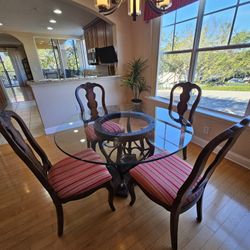 Round Dining room Table 54"glass-top and 4 Fabric Seat Chairs