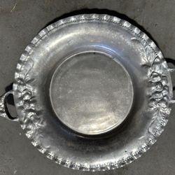 Silver round serving platter with handles