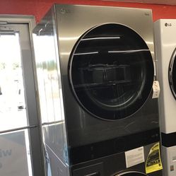New Scratch And Dent LG Front Load Washer And Dryer Stackable Unit. 1 year Warranty 