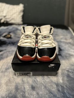 Jordan 11 Low Bred