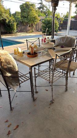 Outdoor table with glass top