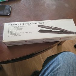 New steam  hair straightener    stalion.  Never been use