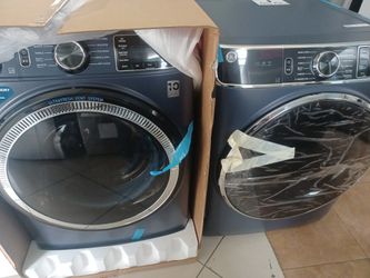 GE Sapphire Blue Front Load Washer And Drayee