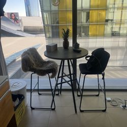 Table And Bar Stools