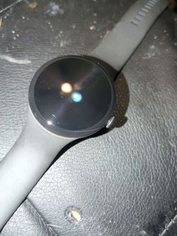Google Pixel Watch 5 with Gray Sport Band