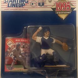 This item is a 1995 Starting Lineup collectible action figure featuring former Los Angeles Dodgers catcher Mike Piazza.